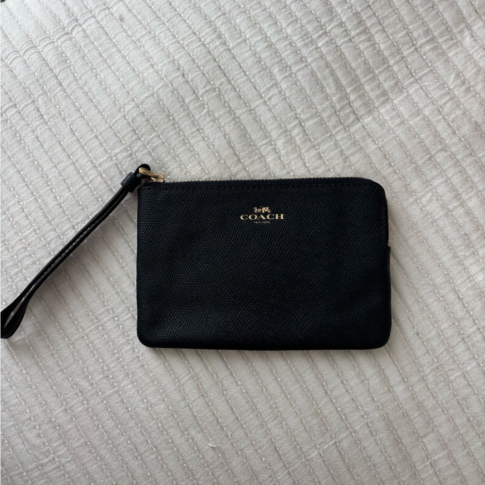 Coach navy blue and gold wristlet wallet